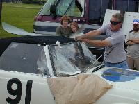Removing the broken windshield on the Brodericks' M-B.
